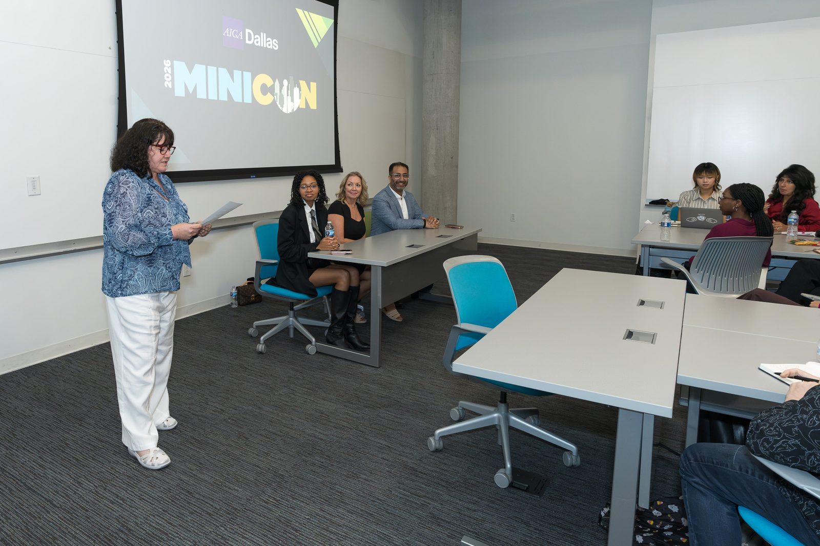 Design students listening to the Mini-Con 2026 industry panel
